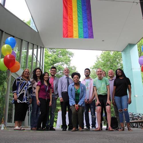 Vice-President and Principal of U of T Mississauga Ulrich Krull (centre) kicked off Pride month Friday with the raising of the Pride flag (photo by Blake Eligh) 