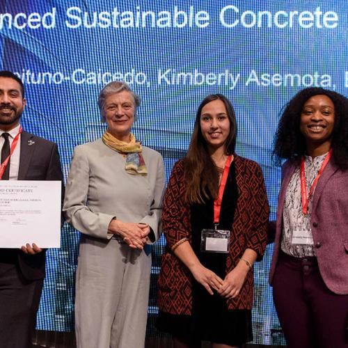 Kimberly Asemota (far right), Blandine Barthod (right) and David Aceituno-Caicedo (left) receive the SDSN Youth Special Prize in Geneva from Nane Annan, a lawyer and wife of former UN secretary general Kofi Annan (photo courtesy of Kimberly Asemota) 