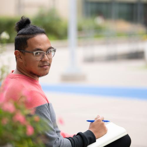 Poet and U of T Scarborough alumnus Adrian De Leon (BA 2014 UTSC, MTS 2017) released a book of poetry inspired by subway stops (photo by Alexa Battler) 