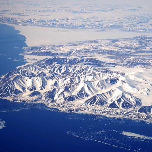An aerial photograph over Nunavut, taken en route to Canadian Forces Station Alert from a CC-177 Globemaster aircraft on June 10, 2016 (photo by Belinda Groves, Task Force Imagery Technician courtesy of Department of National Defence) 