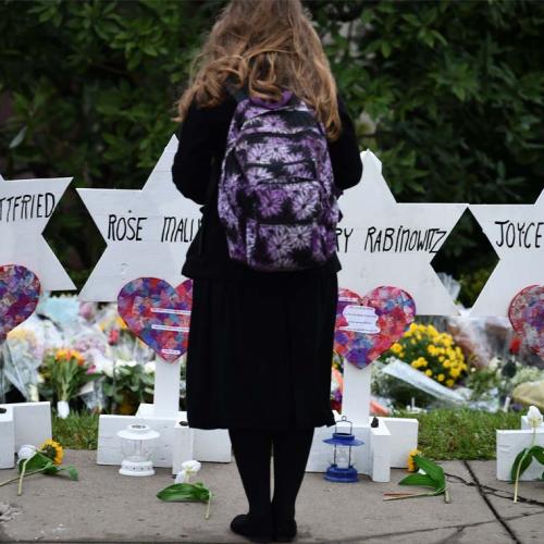 A makeshift memorial located outside of the Tree of Life synagogue in Pittsburgh includes the name Joyce Fienberg, who was a U of T alumna (photo by Brendan Smialowski/ AFP/Getty Images) 