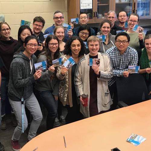 Members of the Jonathan Abbatt and Scott Mabury labs with their signed U of T postcards to #SupportTheReport. The labs answered the @ShoichetLab postcard-signing challenge (photo by Angelika Duffy/The Shoichet Lab) 