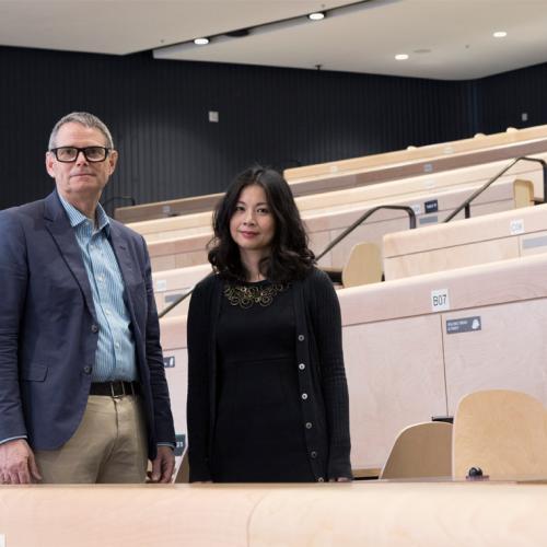 Steven Bailey and Emily Ling of Academic + Campus Events in the Lee & Margaret Lau Auditorium (photo by Romi Levine) 