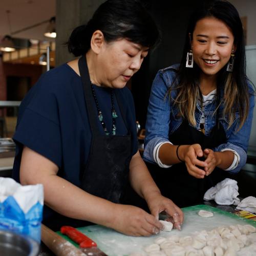Ningsha Zhong, a U of T employee, makes dumplings at Pixar with her daughter Domee Shi, the creator of the Oscar-winning short Bao (photo by Deborah Coleman / Pixar) 