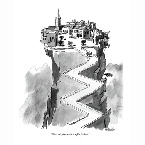 Black and white image of a road leading to a city on a cliff. 