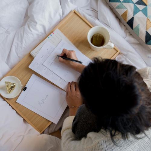 person studying on their room.