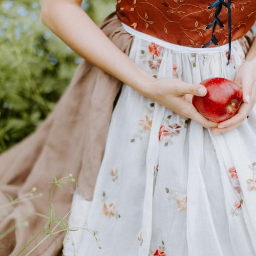 Person holding apple