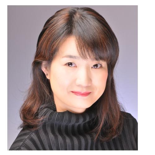A portrait of Minako Uchino smiling.