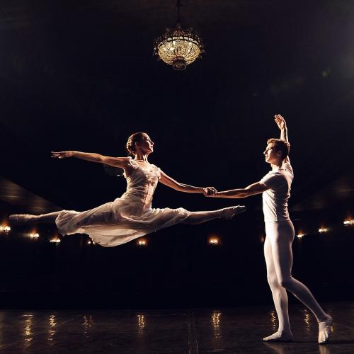 A ballet performance featuring a woman and a man 