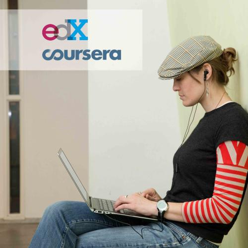 A woman looking at her computer.
